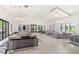 Clubhouse featuring couches and tables at 9425 Holliston Creek Pl, Winter Garden, FL 34787