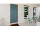 Inviting front porch featuring a rocking chair and charming decor at 9425 Holliston Creek Pl, Winter Garden, FL 34787
