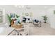 Bright, open living space featuring neutral decor, tile flooring, and stylish furnishings at 9425 Holliston Creek Pl, Winter Garden, FL 34787