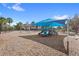 Community playground featuring a modern play structure with a shade canopy at 9425 Holliston Creek Pl, Winter Garden, FL 34787