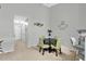 Dining space with modern table, four chairs, and bar seating, great for entertaining at 9616 River Walk Ct, Orlando, FL 32825