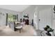 Comfortable living room with a fireplace, a sliding glass door, and a cozy sectional sofa at 9616 River Walk Ct, Orlando, FL 32825