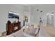 Bright and airy living room featuring a fireplace and comfortable seating at 9616 River Walk Ct, Orlando, FL 32825