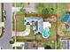 Aerial shot of a home showcasing a private pool, solar panels, and well-maintained lawn at 969 Gran Paseo Dr, Orlando, FL 32825