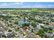 Aerial view of a neighborhood with a pond, highlighting the property's location and surrounding community at 969 Gran Paseo Dr, Orlando, FL 32825