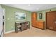 Cozy dining area with a built-in cabinet, serving area, and a bright window view at 969 Gran Paseo Dr, Orlando, FL 32825