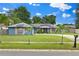Charming single-story home featuring a well-manicured lawn and complementary exterior elements at 969 Gran Paseo Dr, Orlando, FL 32825