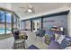 Comfortable screened-in lanai with an area to relax and enjoy the beautiful pool view at 969 Gran Paseo Dr, Orlando, FL 32825