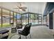 Inviting screened-in lanai overlooking the pool and backyard, perfect for entertaining at 969 Gran Paseo Dr, Orlando, FL 32825