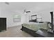 Spacious main bedroom with neutral walls, and a view to the wooded backyard at 969 Gran Paseo Dr, Orlando, FL 32825