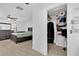 Spacious main bedroom featuring a walk-in closet, ceiling fan, and neutral flooring at 969 Gran Paseo Dr, Orlando, FL 32825