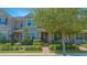 Charming exterior elevation with manicured landscaping and brick pathway leading to a covered porch at 10520 Burrows St, Orlando, FL 32832