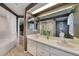 Bathroom with double sinks and vanity, plus bathtub with shower at 1074 Kensington Park Ct # 101, Altamonte Springs, FL 32714
