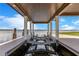 Covered boat lift with modern machinery and lifts, ready for your personal watercraft or boat at 10845 Bayshore Dr, Windermere, FL 34786