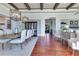 Dining room with hardwood floors leads to front entry and living area at 10845 Bayshore Dr, Windermere, FL 34786