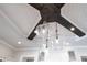 Unique and modern pendant lighting fixtures above the kitchen island at 10845 Bayshore Dr, Windermere, FL 34786