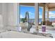 Kitchen sink featuring granite counters, a view of the lake, stainless fixtures and recessed lighting at 10845 Bayshore Dr, Windermere, FL 34786
