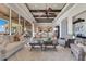 Bright living room with lake views, comfortable furniture, and stylish decor at 10845 Bayshore Dr, Windermere, FL 34786