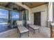 Relaxing patio with chaise lounges provides serene water views and outdoor enjoyment at 10845 Bayshore Dr, Windermere, FL 34786