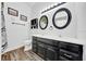 Bright bathroom featuring double sinks, modern fixtures, and stylish flooring at 1115 S Mary St, Eustis, FL 32726