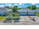 Charming home featuring a well-maintained yard, inviting curb appeal, and a spacious two-car garage at 1115 S Mary St, Eustis, FL 32726
