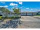 Charming home featuring a spacious driveway and a welcoming two-car garage at 1115 S Mary St, Eustis, FL 32726