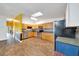 Well-appointed kitchen featuring stainless steel appliances, ample cabinet space, and a functional layout for cooking at 1115 S Mary St, Eustis, FL 32726