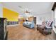 Bright and airy living room showcasing an open floor plan that seamlessly connects to the kitchen at 1115 S Mary St, Eustis, FL 32726