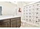 Simple bathroom featuring a large mirror, modern vanity, a toilet, and a shower with a curtain at 1147 Wildmeadow Run, Winter Park, FL 32792