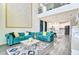 Open concept living room with high ceilings flows into the kitchen for easy entertaining at 1147 Wildmeadow Run, Winter Park, FL 32792