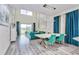 Open concept living area boasts soaring ceilings, backyard views, and modern design at 1147 Wildmeadow Run, Winter Park, FL 32792