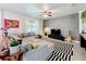 Living room with a large gray sectional sofa, modern decor, and plenty of natural light at 11868 Thatcher Ave, Orlando, FL 32836