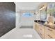 Modern bathroom with a glass shower, vanity, and sleek fixtures at 13791 Abberwick Dr, Orlando, FL 32832