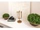 Close-up of stylish decorations including greenery and a golden candle holder on a white countertop at 13791 Abberwick Dr, Orlando, FL 32832