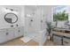 Updated bathroom featuring walk-in shower with white herringbone tile, modern fixtures, and vanity at 1425 Paget Cv, Sanford, FL 32771