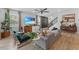 Bright and modern living room with a cozy sofa, stylish decor, and ample natural light at 1425 Paget Cv, Sanford, FL 32771