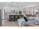 Open-concept living space combining kitchen, dining area, and living room, perfect for Gathering gatherings at 1425 Paget Cv, Sanford, FL 32771