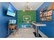 The office space has a unique accent wall at 1425 Paget Cv, Sanford, FL 32771