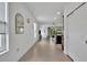 Open concept living area with tile floors, natural light, and a view to the outdoors at 14325 Hidden Ct, Clermont, FL 34711