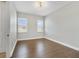 Bedroom featuring wood-look flooring and natural light at 14525 Englert Aly, Orlando, FL 32827