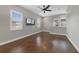 Bright bonus room with hardwood floors, recessed lighting, and large windows offering ample natural light at 14525 Englert Aly, Orlando, FL 32827