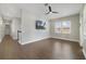 Bonus room featuring wood-look flooring and mounted television at 14525 Englert Aly, Orlando, FL 32827