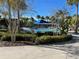 Beautiful community pool featuring lounge chairs, lush landscaping, and shaded seating areas, perfect for relaxation at 14525 Englert Aly, Orlando, FL 32827