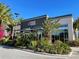 Exterior shot of LP Fit surrounded by tropical plants on a sunny day at 14525 Englert Aly, Orlando, FL 32827