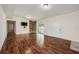 Spacious living room features hardwood floors, pool access, and lots of natural light at 1470 Winston Rd, Maitland, FL 32751
