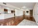 Expansive living area with hardwood floors, open kitchen, and natural light at 1470 Winston Rd, Maitland, FL 32751