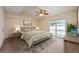 Cozy main bedroom with a ceiling fan, sliding glass doors to pool, and neutral decor at 1470 Winston Rd, Maitland, FL 32751