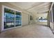 Large patio with outdoor seating, sliding glass door, and a view of the swimming pool at 1470 Winston Rd, Maitland, FL 32751