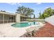 Backyard with a screened in area, outdoor seating and inviting swimming pool at 1470 Winston Rd, Maitland, FL 32751