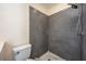Modern bathroom featuring a tiled walk-in shower with a rainfall shower head and sleek design at 1470 Winston Rd, Maitland, FL 32751